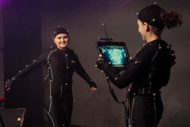 Motion capture performers in action